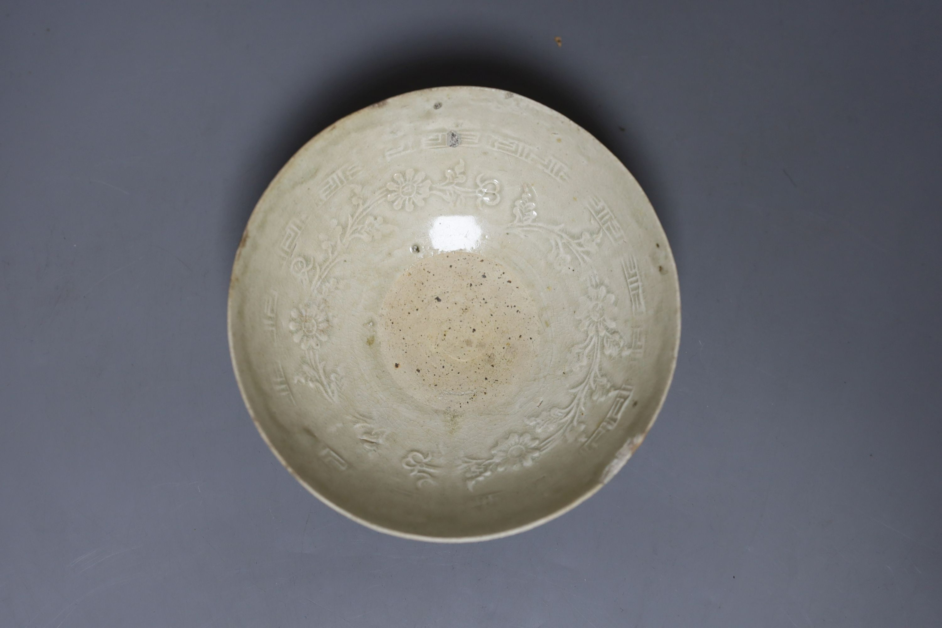 An 18th century Chinese export saucer dish, crackle glaze vase and a Qingbai bowl, diameter 15cm